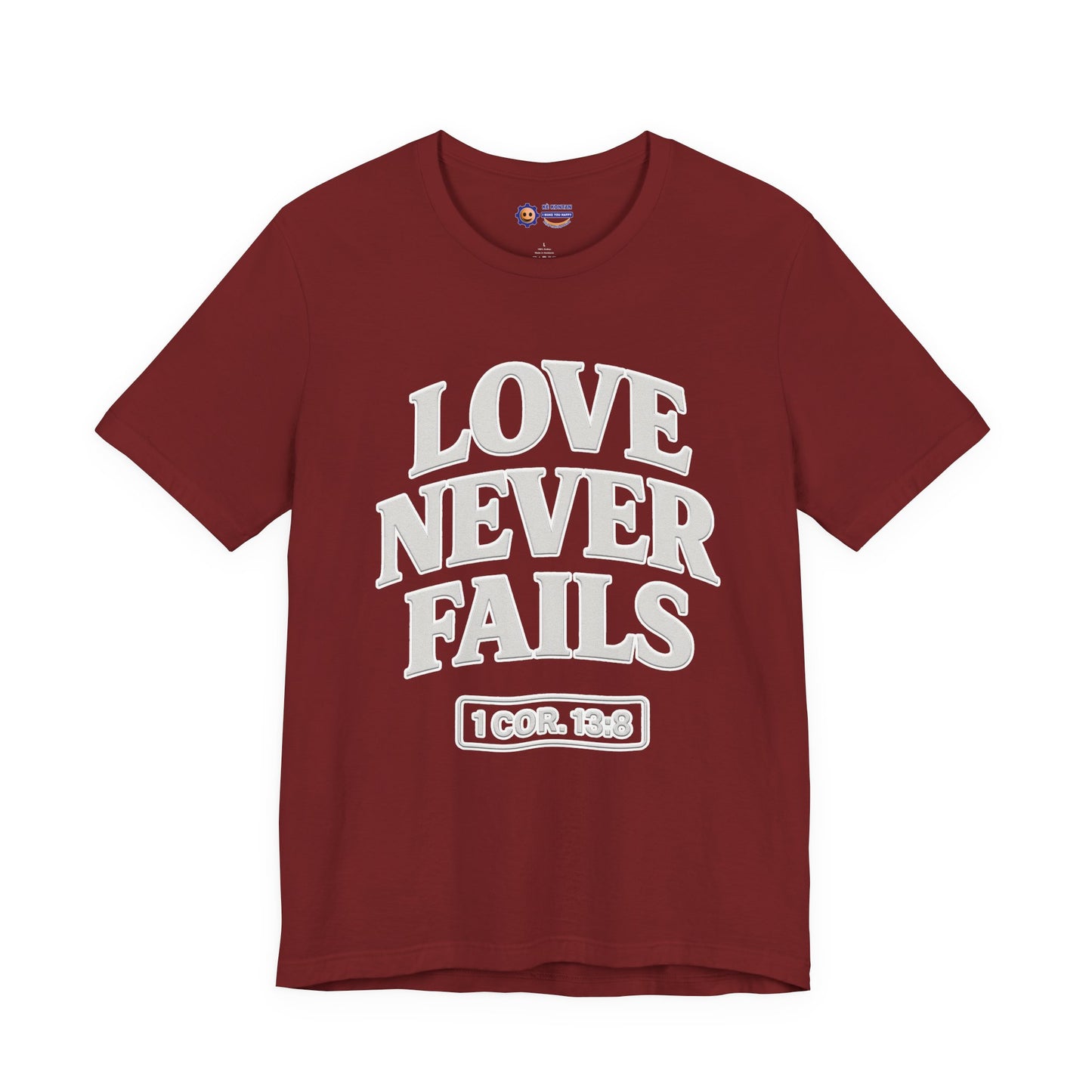 Maroon t-shirt with 'LOVE NEVER FAILS' text on a white background