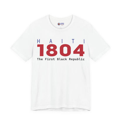 White t-shirt with red and blue text on a white background