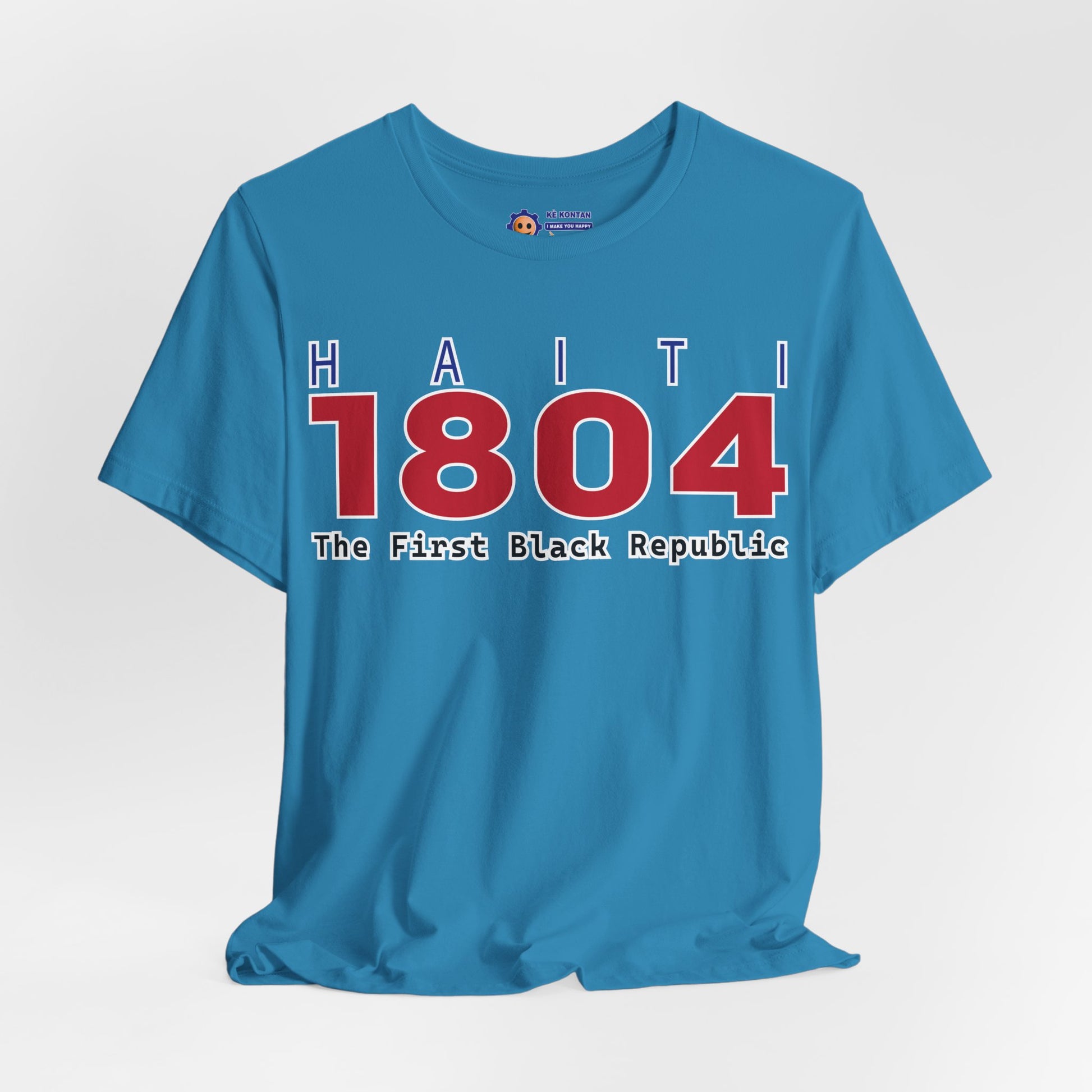 Blue t-shirt with 'Haiti 1804 The First Black Republic' text on a white background