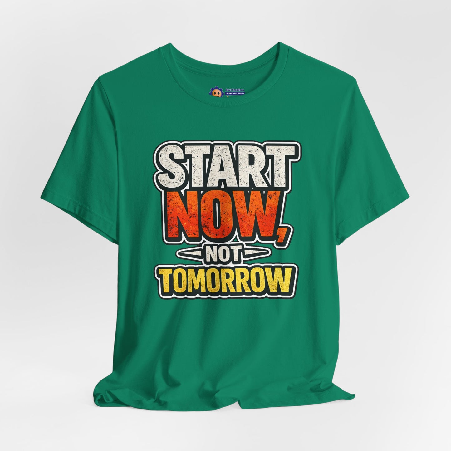 Green t-shirt with motivational text 'Start Now, Not Tomorrow' on a light gray background
