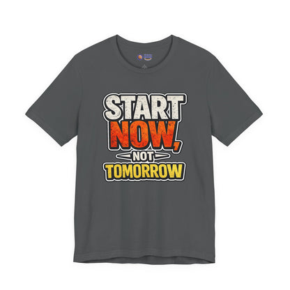 Gray t-shirt with motivational text 'Start Now, Not Tomorrow' on a white background