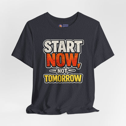 Black t-shirt with motivational quote 'Start Now, Not Tomorrow' on a white background