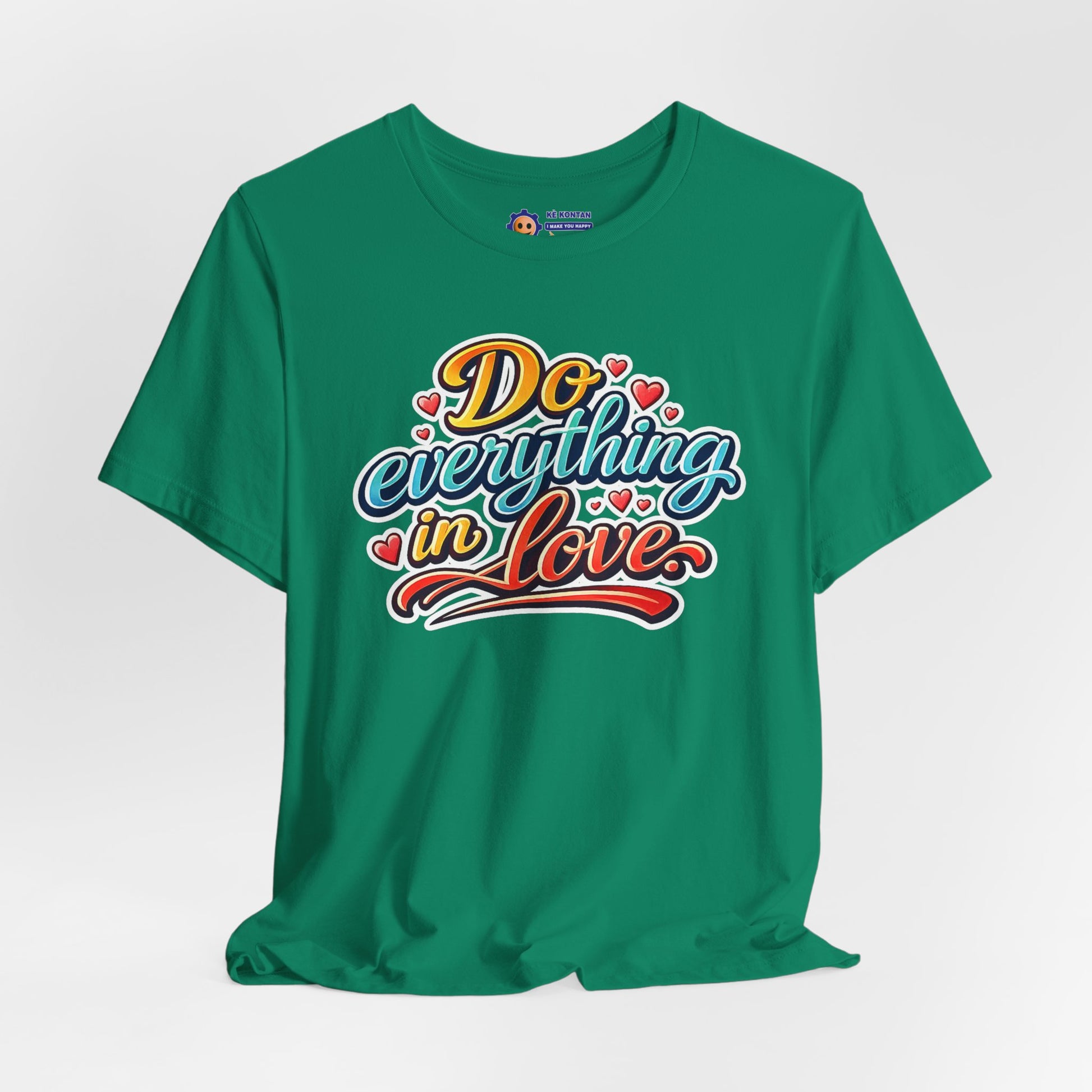 Green t-shirt with 'Do everything in love' text on a white background
