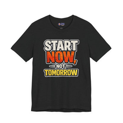 Black t-shirt with motivational quote 'Start Now, Not Tomorrow' on a white background