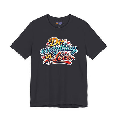 Black t-shirt with colorful 'Do everything in love' text design on a white background