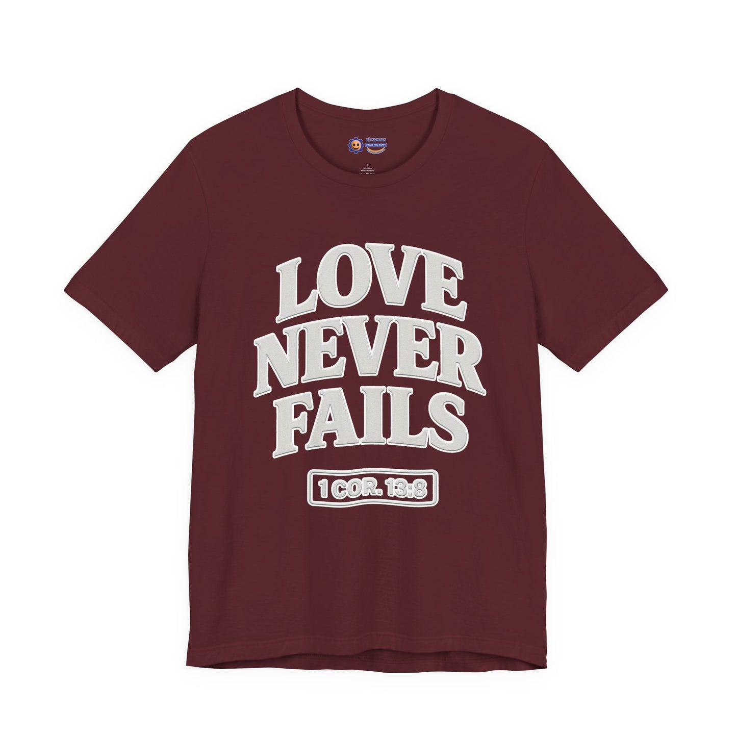 Maroon t-shirt with 'LOVE NEVER FAILS' text on a white background