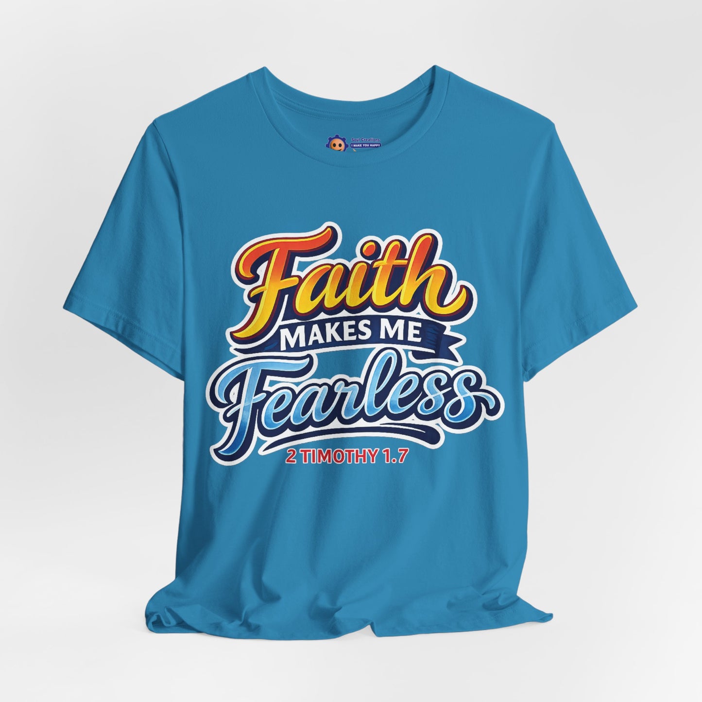 Blue t-shirt with 'Faith Makes Me Fearless' text on a light gray background