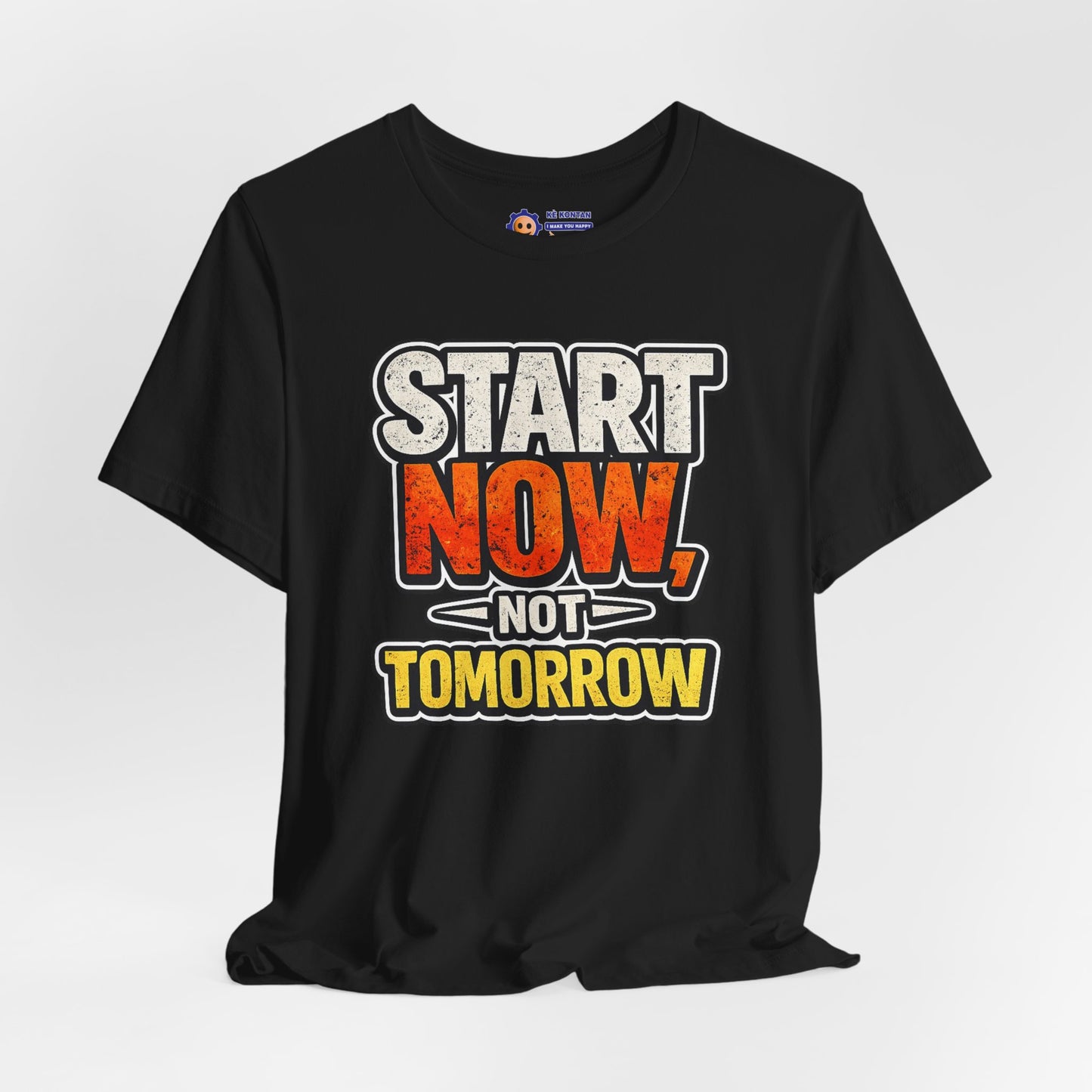 Black t-shirt with motivational quote 'Start Now, Not Tomorrow' on a white background