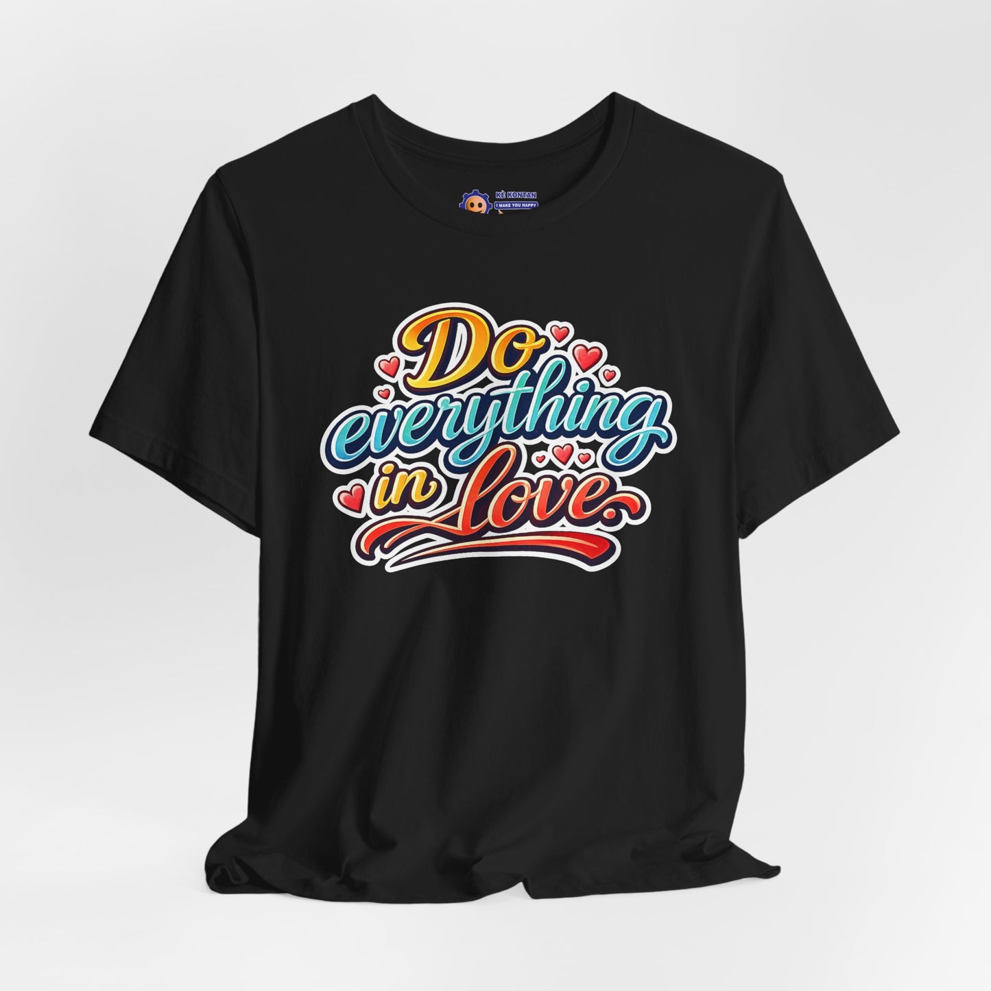 Black t-shirt with colorful 'Do everything in Love' text design on a white background