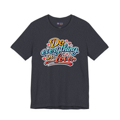 Dark gray t-shirt with colorful 'Do everything in love' text on a white background