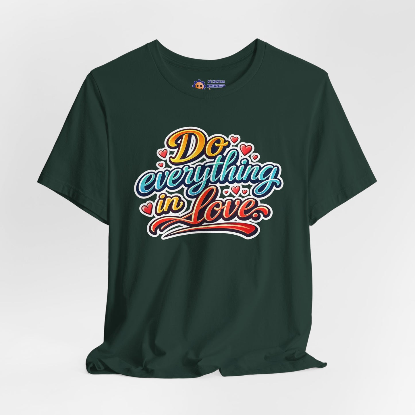Dark green t-shirt with colorful 'Do everything in Love' text design on a light gray background