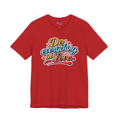 Red t-shirt with colorful text 'Do everything in love' on a white background