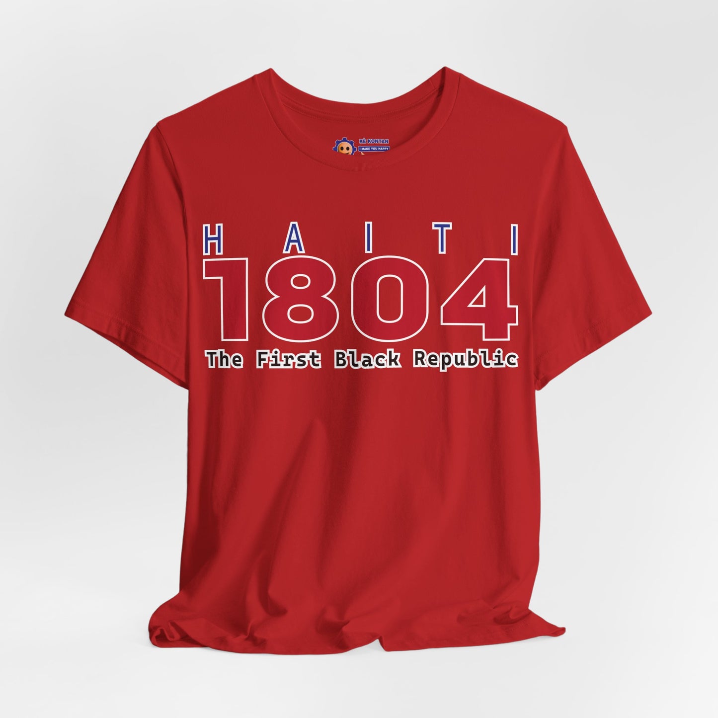 Red t-shirt with 'Haiti 1804 The First Black Republic' text on a white background