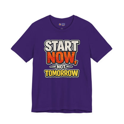 Purple t-shirt with motivational text 'Start Now, Not Tomorrow' on a white background