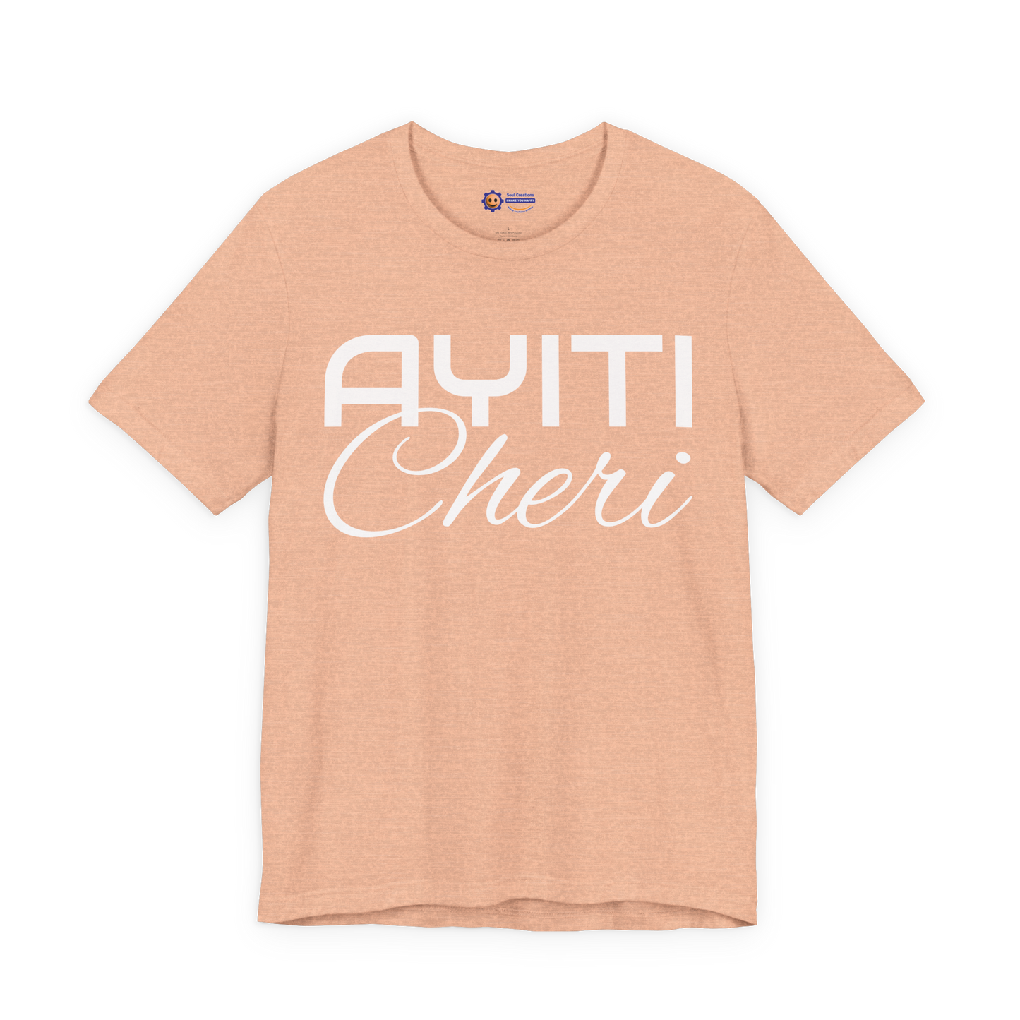 Heather Peach t-shirt with 'Ayiti Cheri' text on a white background