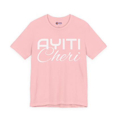 Pink t-shirt with 'Ayiti Cheri' text on a white background