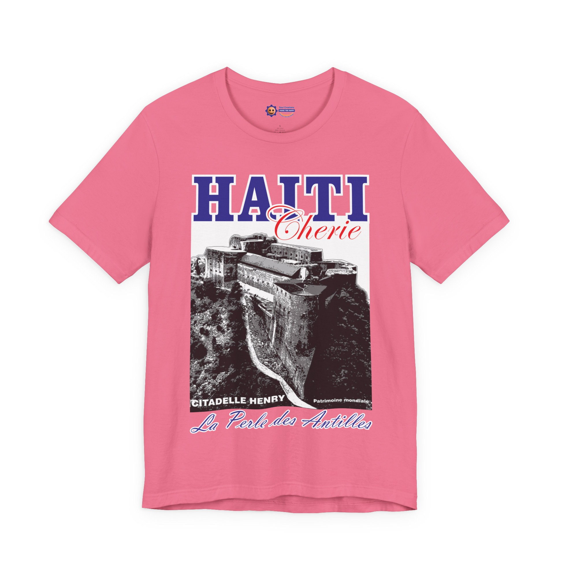 Pink t-shirt with Haiti-themed design featuring a castle and text on a white background