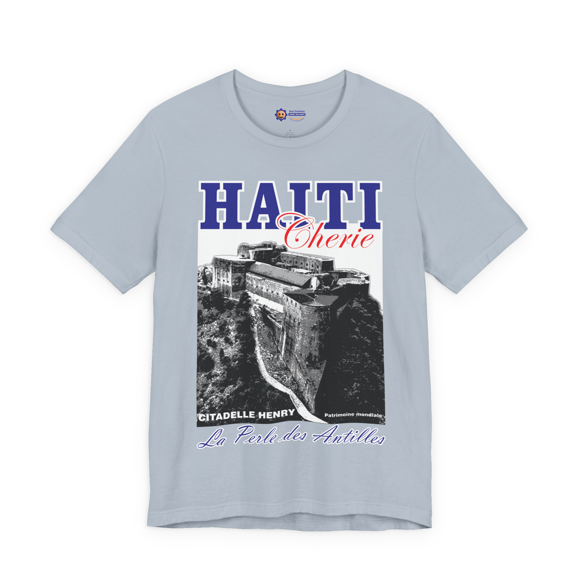 Light blue t-shirt with Haiti-themed graphic design on a white background