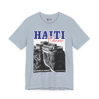 Light blue t-shirt with Haiti-themed graphic design on a white background