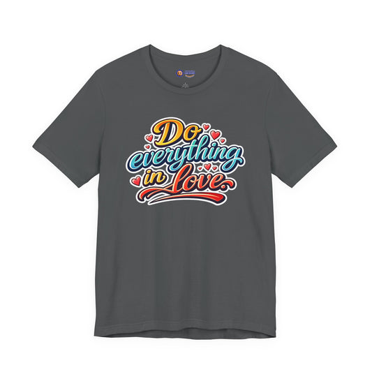 Gray t-shirt with colorful 'Do everything in love' text design on a white background